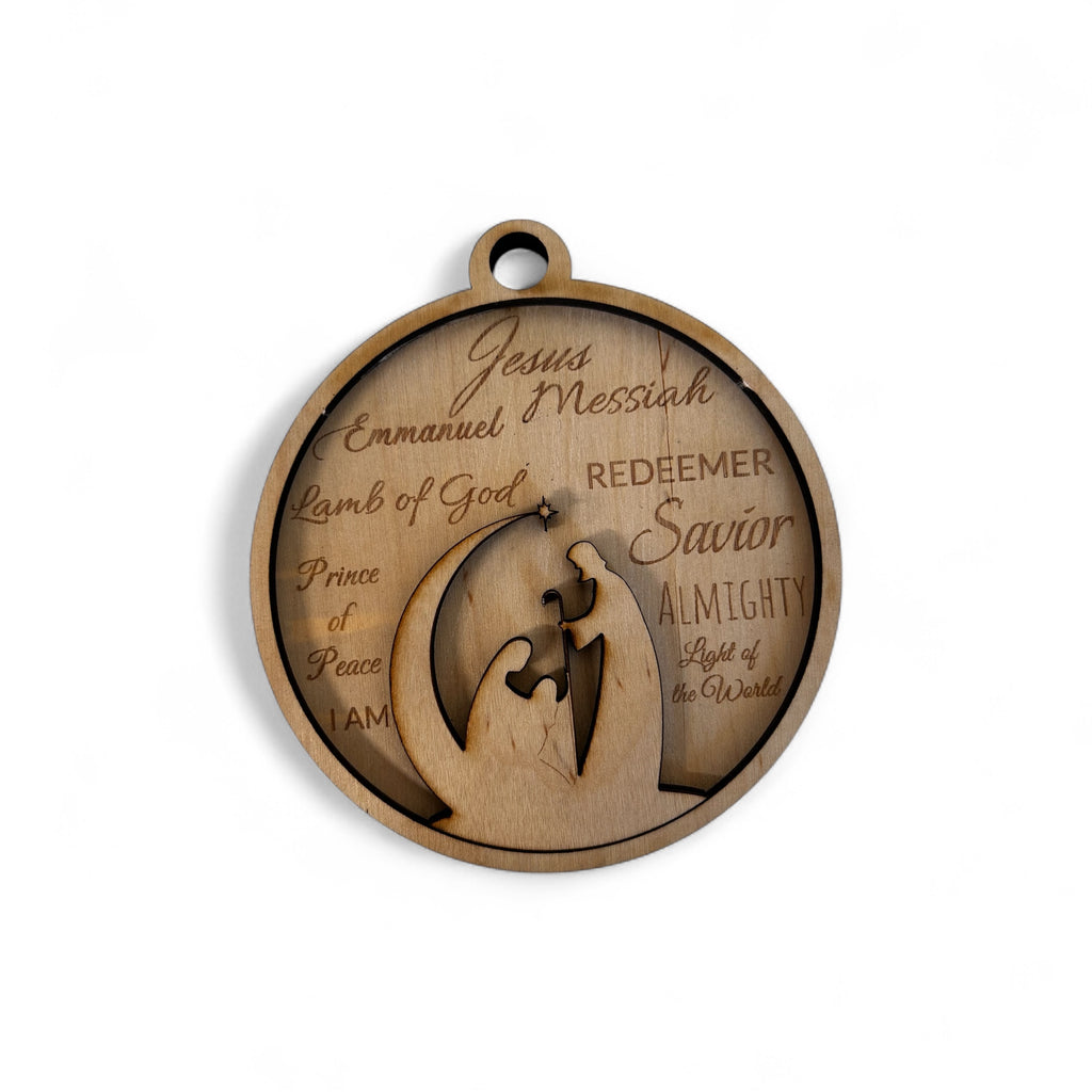 Round hand-stained maple wood ornament with the Holy Family and names of Christ engraved in the background.