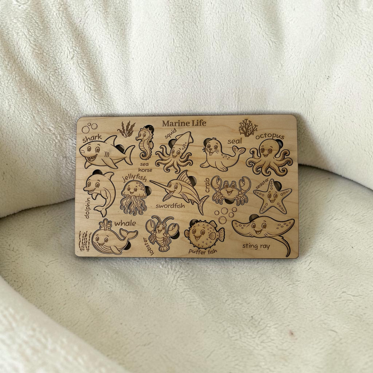 Marine Life wooden puzzle board with pieces partially placed